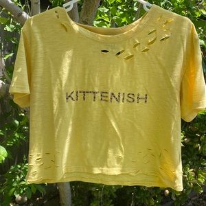 Cropped yellow top with leopard print and holes to match leopard marks